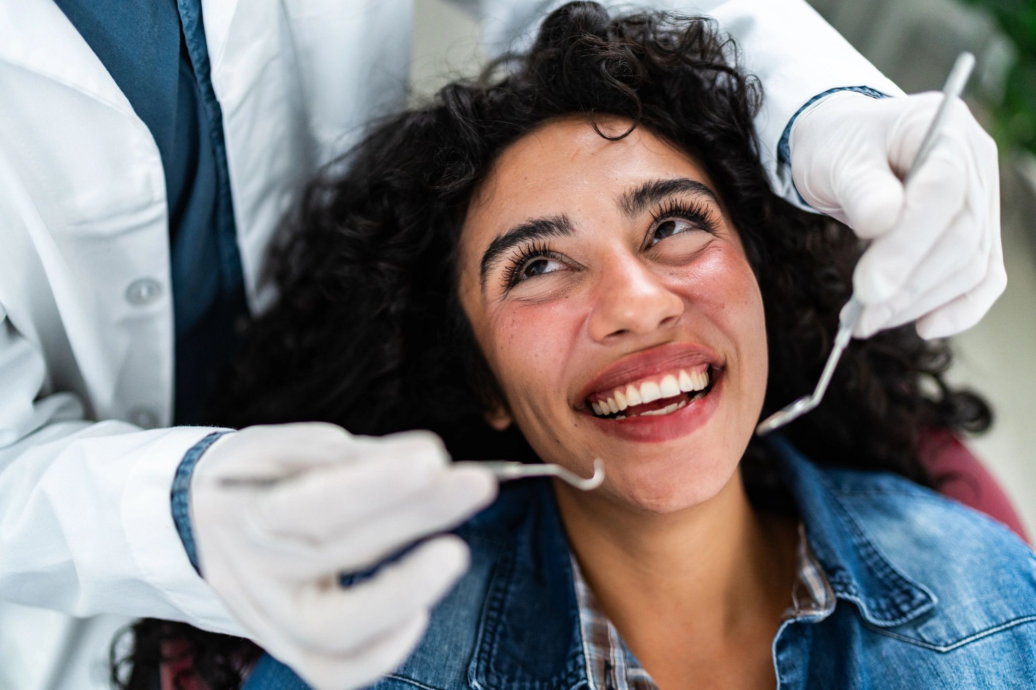 Gentle dental examination in a bright clinic
